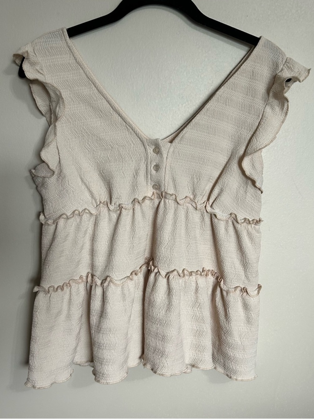 Sleeveless Tiered V-Neck Ruffle Blouse in Cream